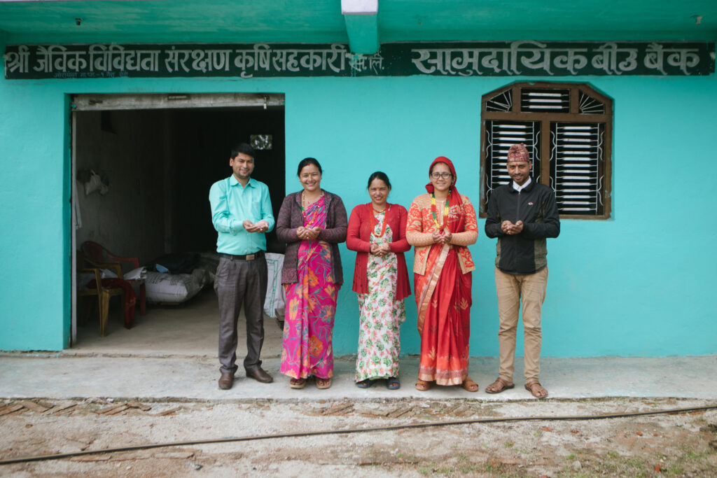 Members of the Jaibikbibhidhata Conservation Agriculture Cooperative(Ghanteshwor community seed bank), Gaira, Doti showing various kinds of seed in their seed bank.